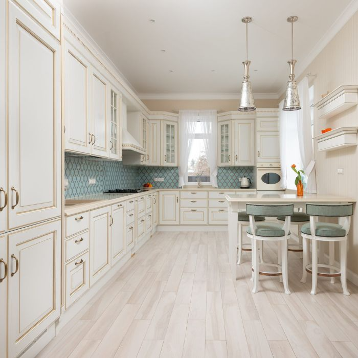 Modern white kitchen with vinyl tile flooring