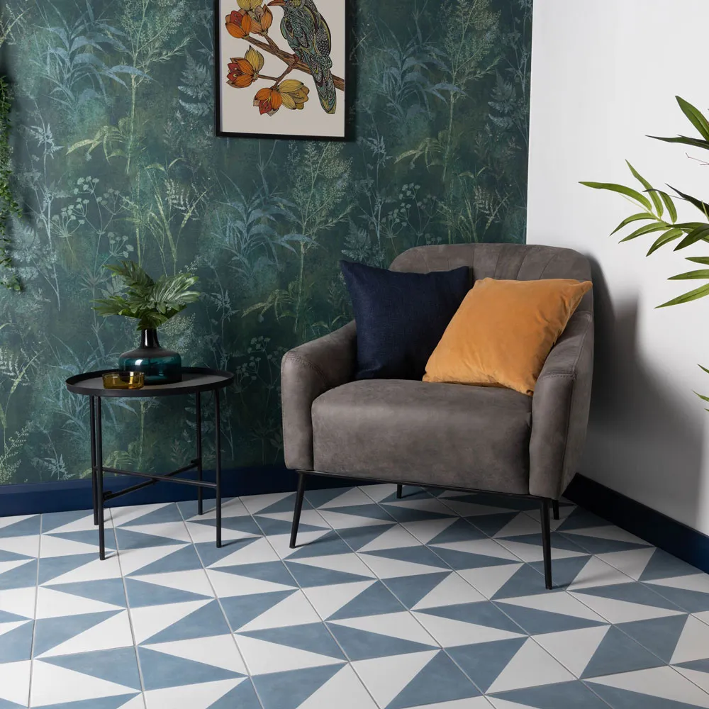 Minimalist room with a lone chair and a potted plant