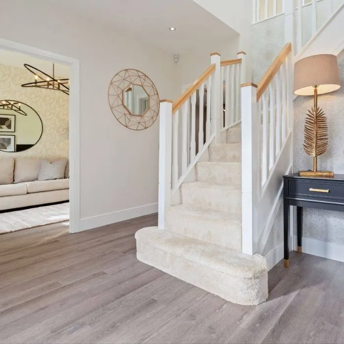 Cosy hallway with wooden flooring and elegant lighting