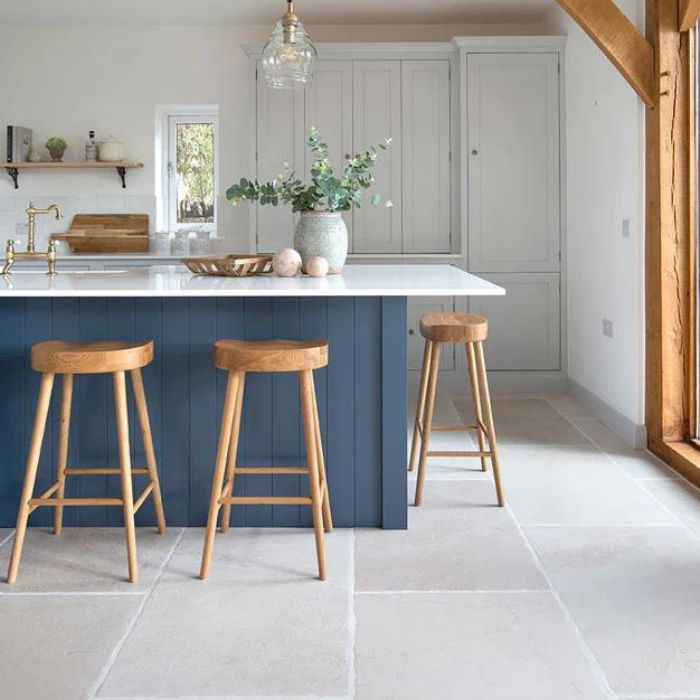 Kitchen featuring a blue and white colour scheme