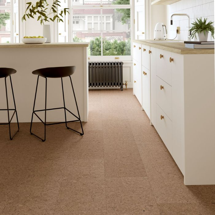 Charming kitchen space with cork tiles enhancing the ambience