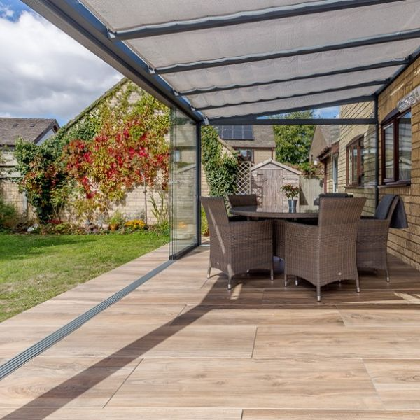 Deck space featuring rustic table & chairs