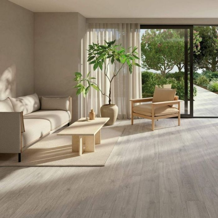 Cream-coloured wood-effect porcelain floor tiles in a living room