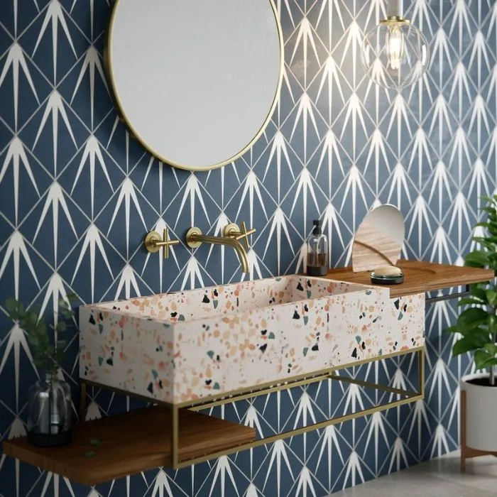 Art deco blue and white tile pattern in a modern bathroom