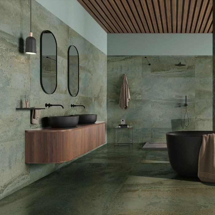 Modern bathroom design featuring green tiles