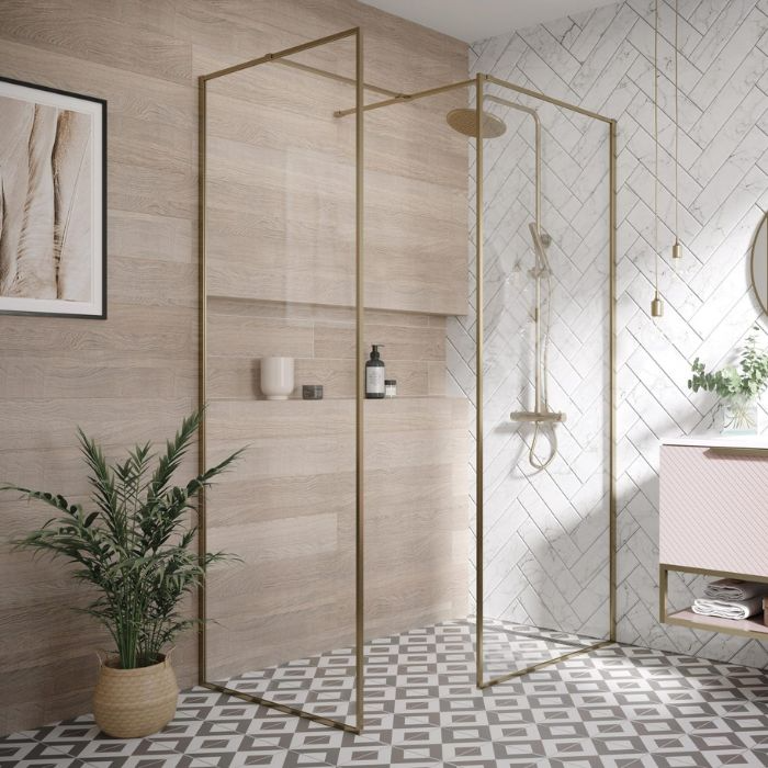 Stylish bathroom with patterned floor tiles and sleek shower stall