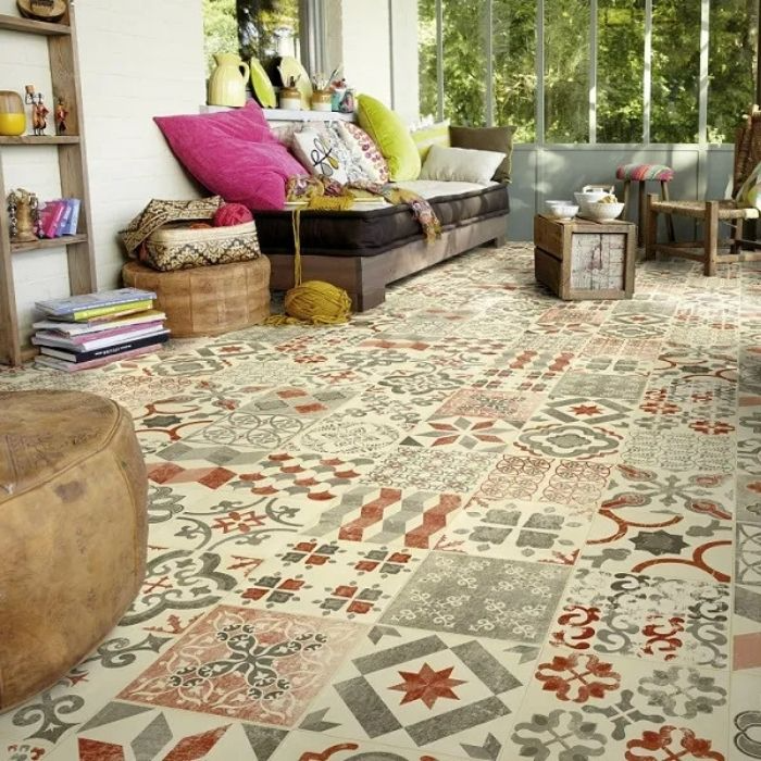 A vibrant living room featuring a striking colourful tile floor that adds character to the space 