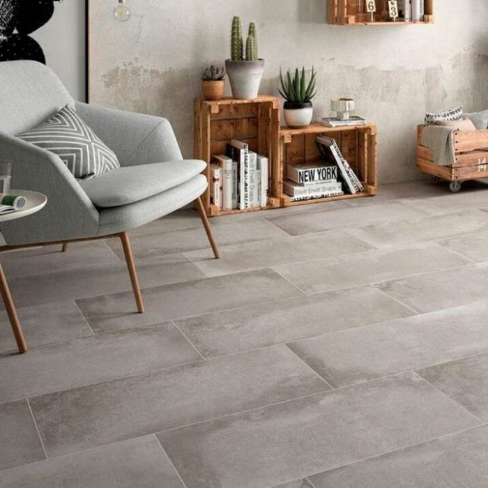 Elegant living space showcasing a chic grey tiled floor