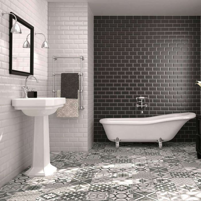 Black and white tiled floor in modern bathroom