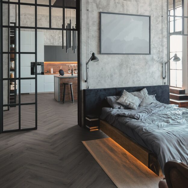 Modern bedroom design with chic herringbone tile flooring