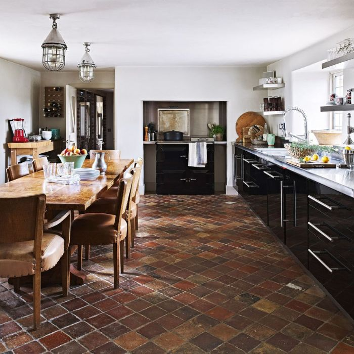 Terracotta tiled kitchen with ample dining space