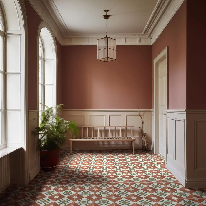 A charming hallway with muted brown walls complemented by a decorative tiled floor