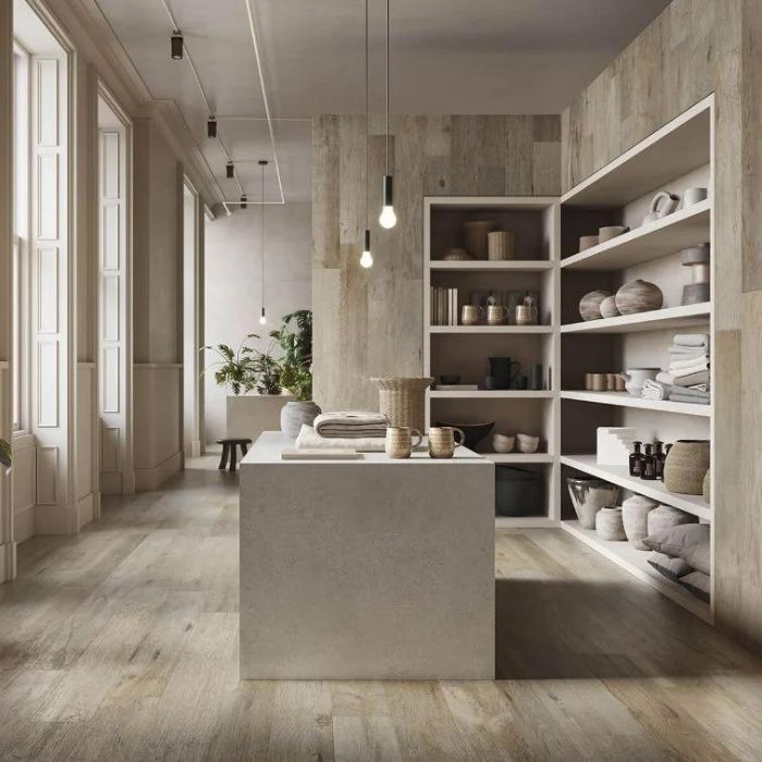 A warm kitchen atmosphere with wooden floors and shelves