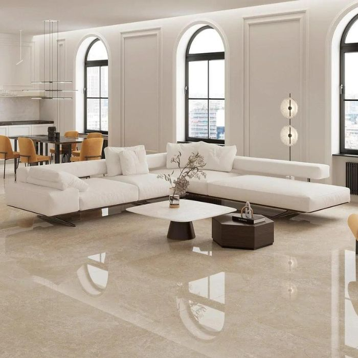 Elegant modern living room with pristine white furniture on luxurious marble floors