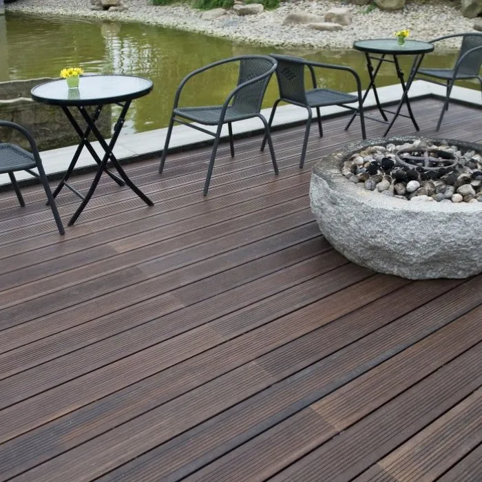 Bamboo wooden deck with fire pit and chairs