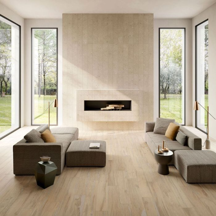 Contemporary living area featuring a fireplace and wooden floors