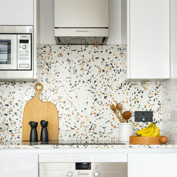 Contemporary kitchen with terrazzo splashback