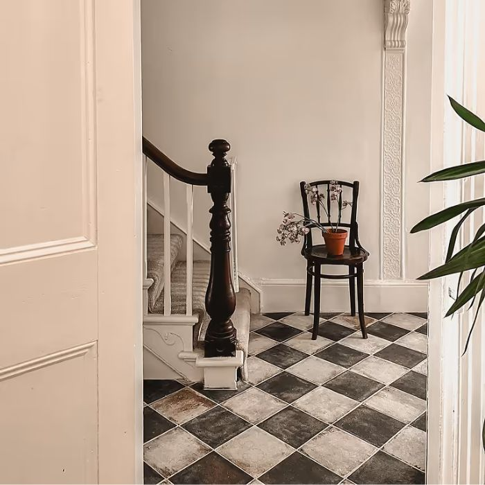 Timeless black and white checkered floor in a hallway