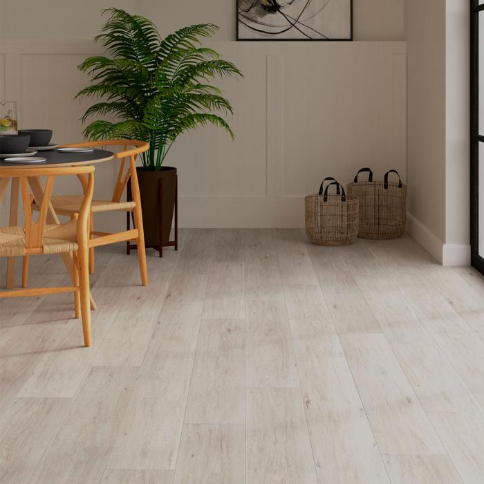 Airy living room design with white Cork floors and a chic wooden table as the focal point