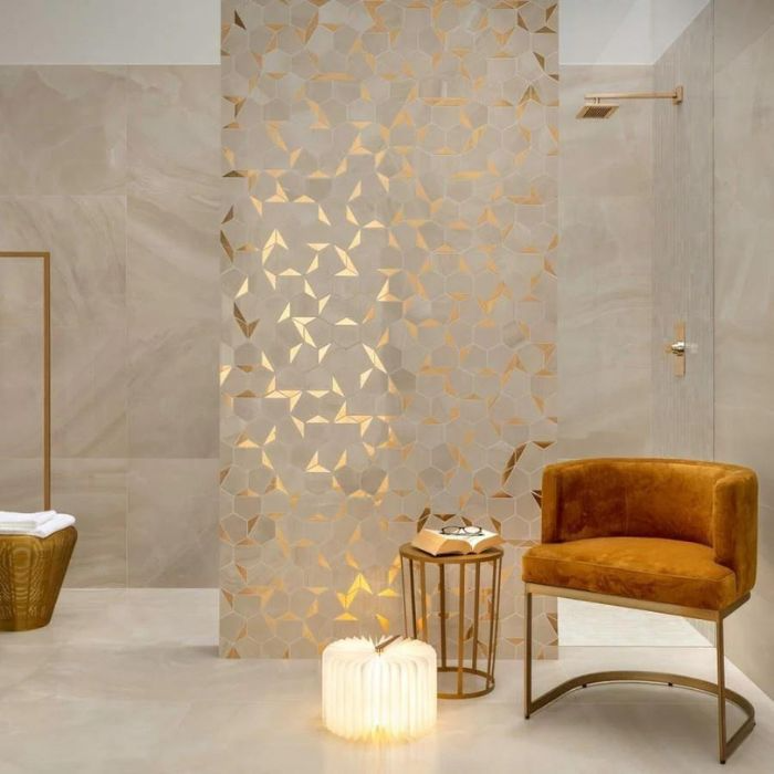 A modern bathroom decorated with eye-catching gold mosaic tiles