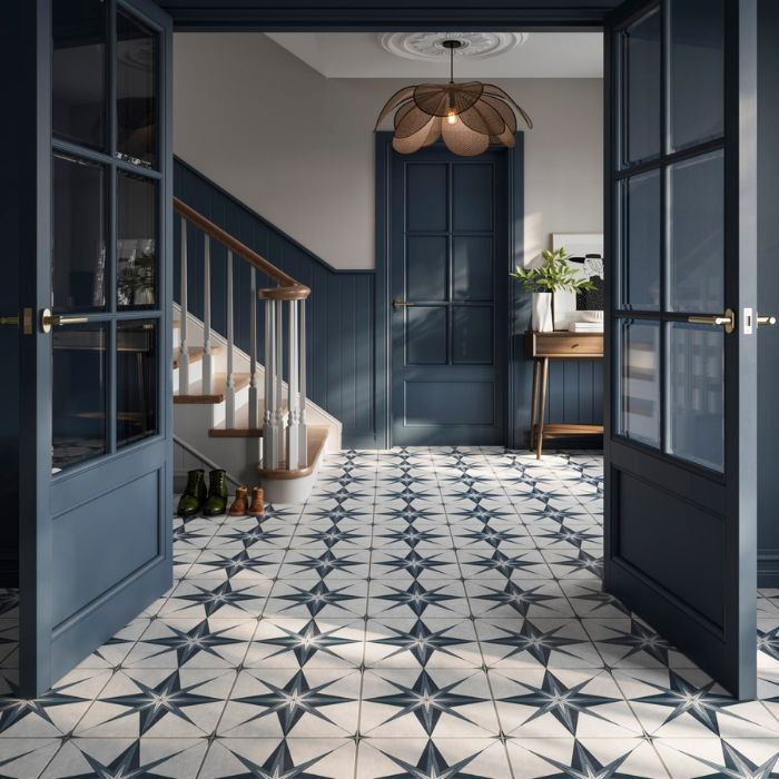 Hallway with star-patterned blue and white floor tiles