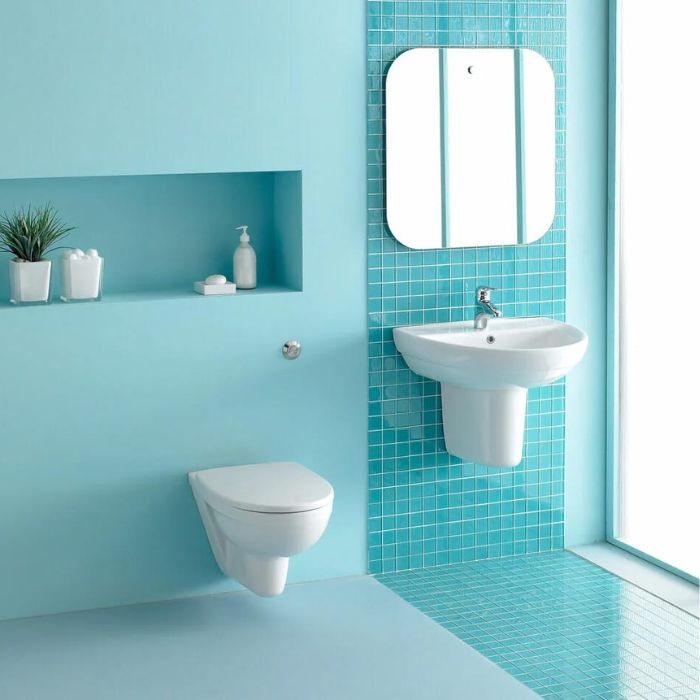 Elegant blue tile design in a functional bathroom setting