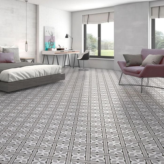 Tranquil bedroom setting featuring a patterned grey and white tiled floor