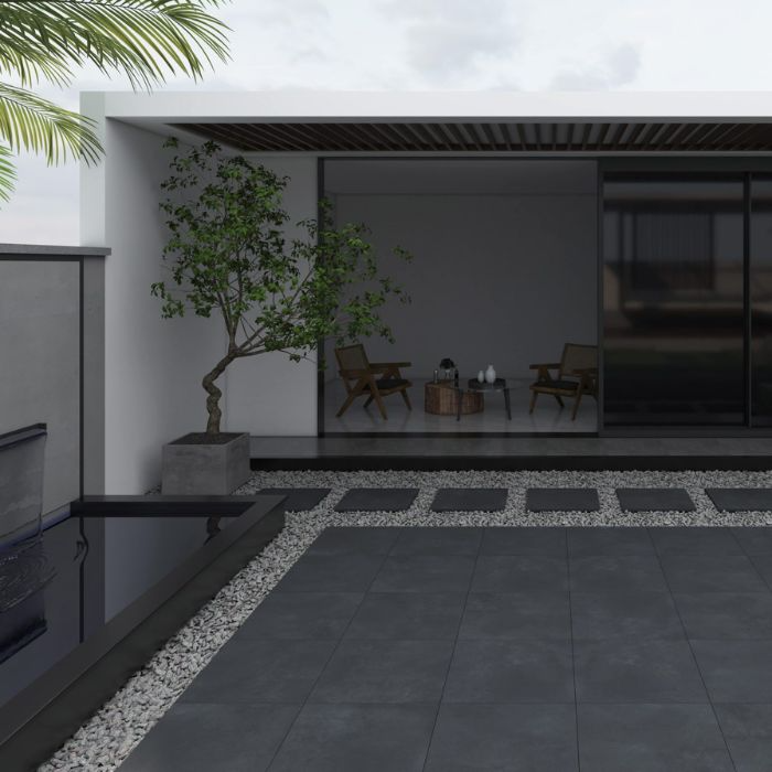 Modern patio with sleek black tiled floor and stylish fireplace