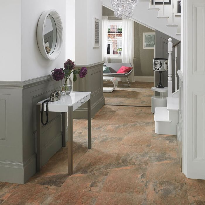 Hallway with mocha-coloured tiles