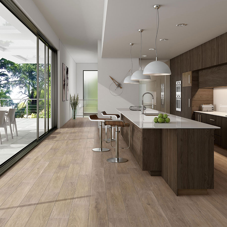 Elegant kitchen interior featuring wood-effect floors and a spacious window for natural light