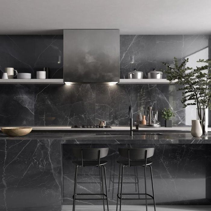 Contemporary kitchen design featuring luxurious black marble surfaces