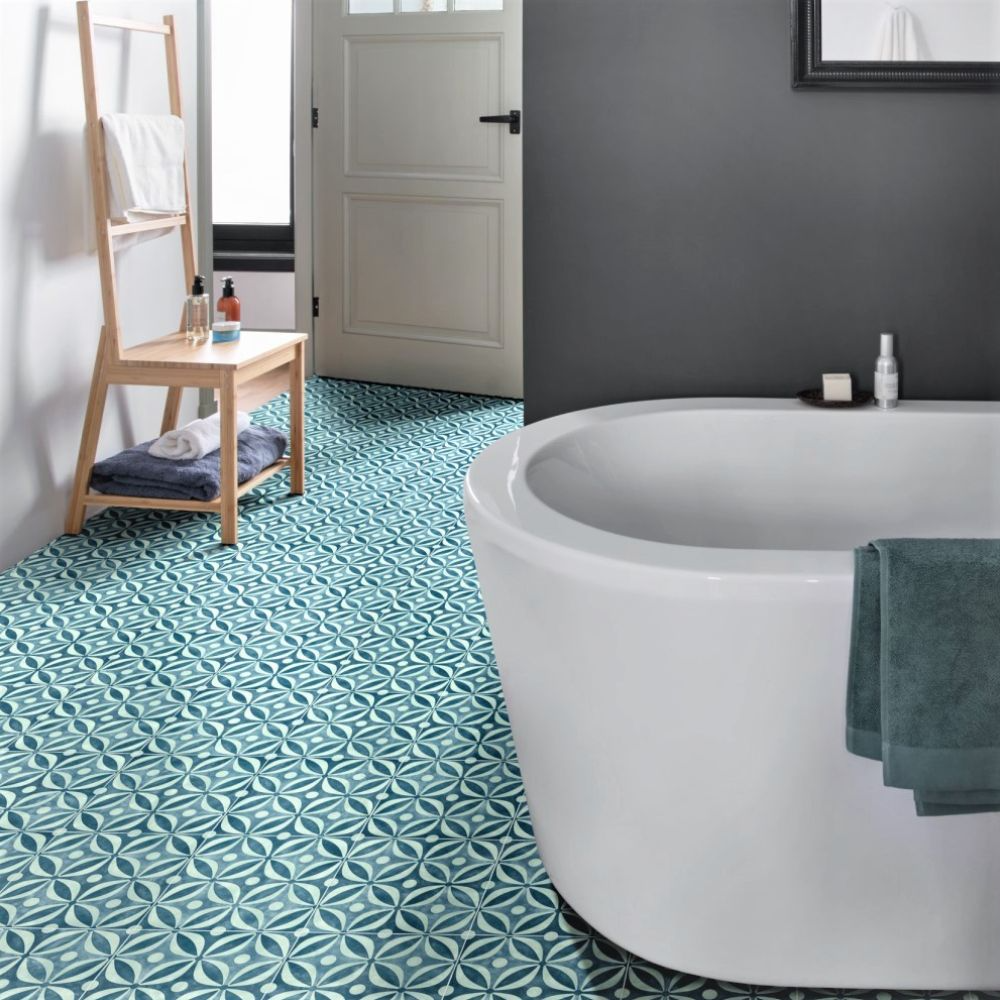 stylish teal and white vinyl tile flooring in a bathroom