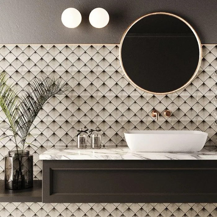 Bathroom adorned with black and white art deco tiles