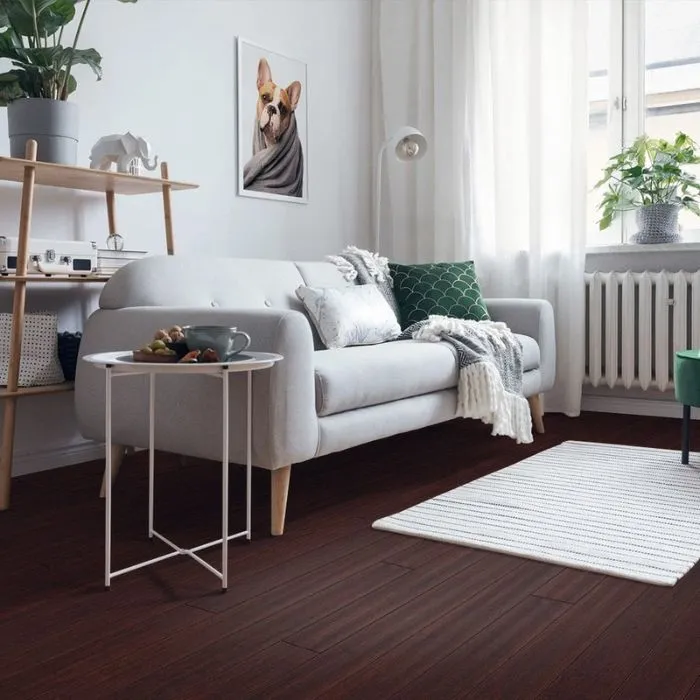 White sofa in a stylish wooden-floored lounge