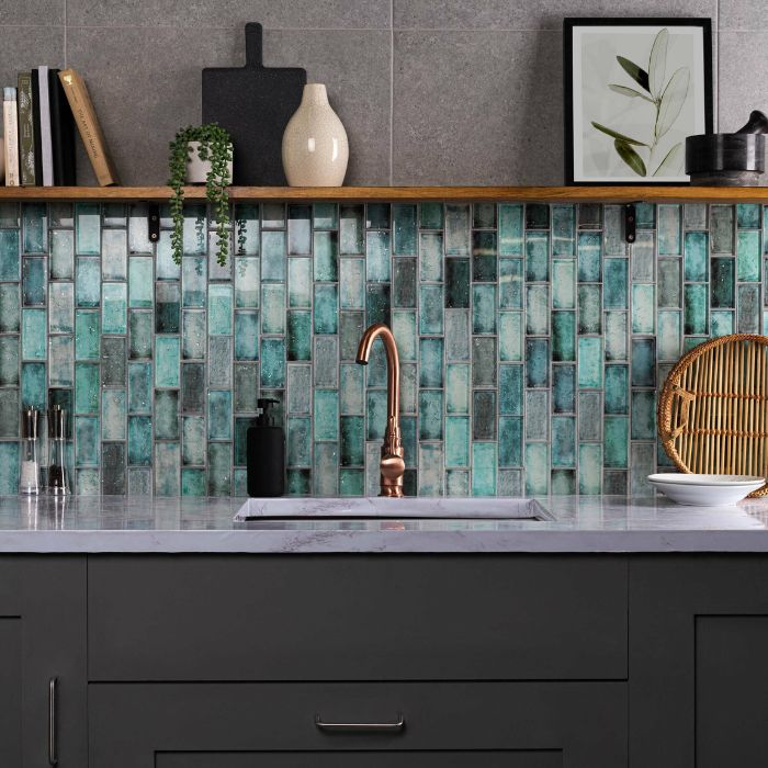 Elegant green mosaic tiles in a well-lit kitchen