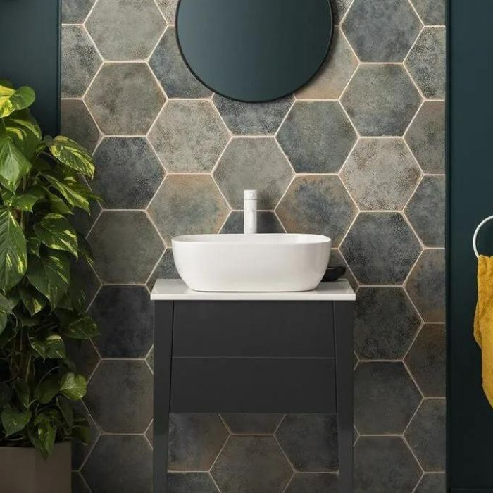 Stylish geometric patterned wall in a bathroom