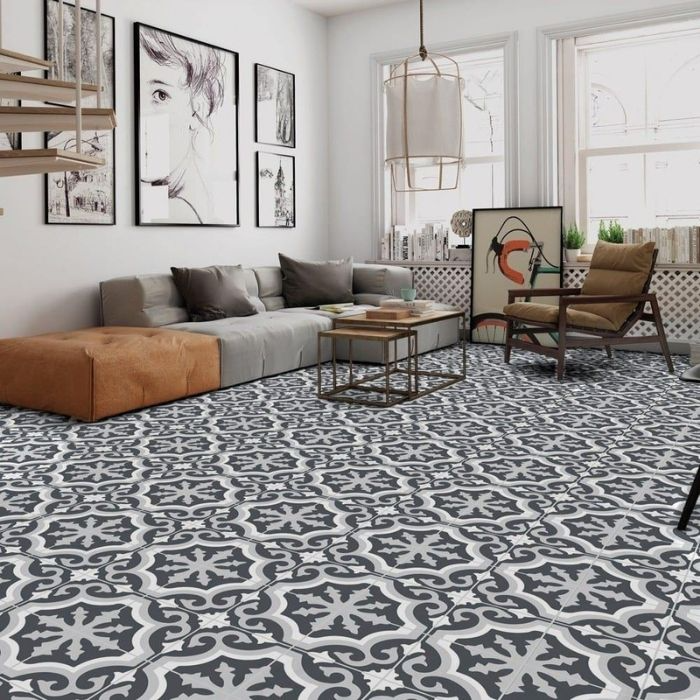 Living room with black and white patterned floor tiles and wall art