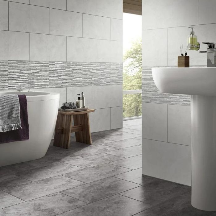 Monochrome bathroom with various tiling patterns