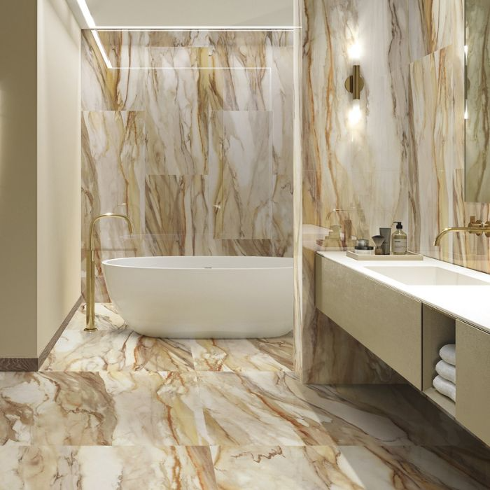 Elegant bathroom with marble floors and a luxurious tub