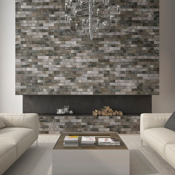 Elegant living room showcases a textured brick wall, creating a bold focal point in the modern decor