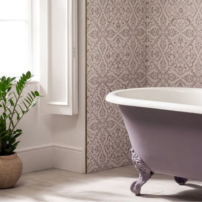 Bathroom with an elegant lilac bohemian feature wall