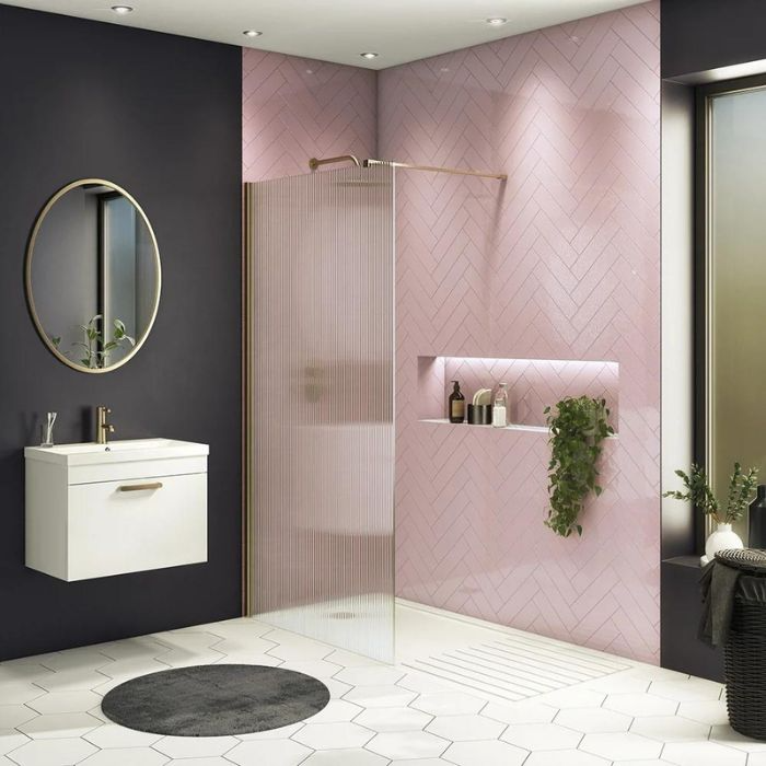 Elegant bathroom design in pink and black colour scheme