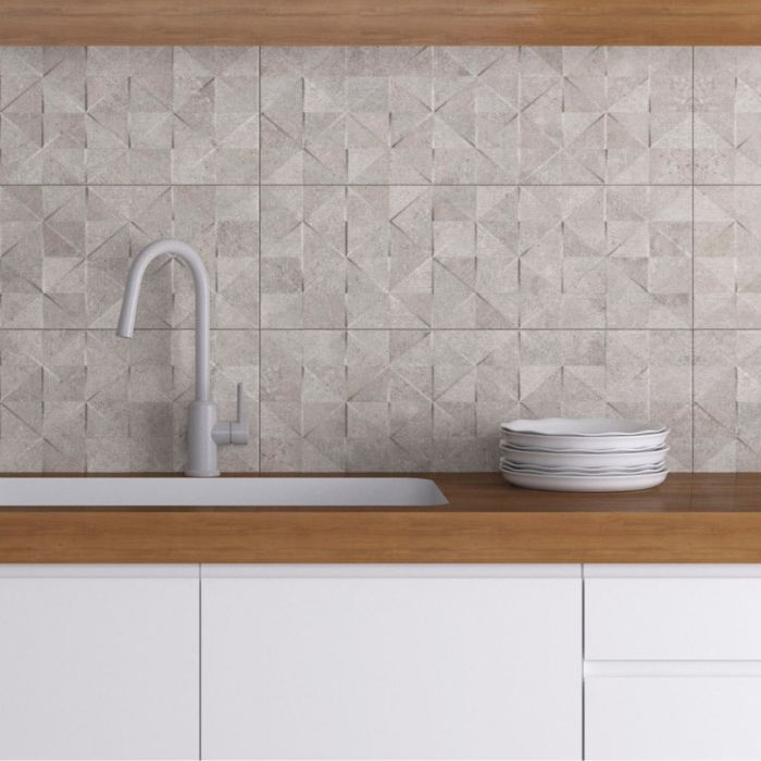 Modern kitchen design with textured white tile backsplash