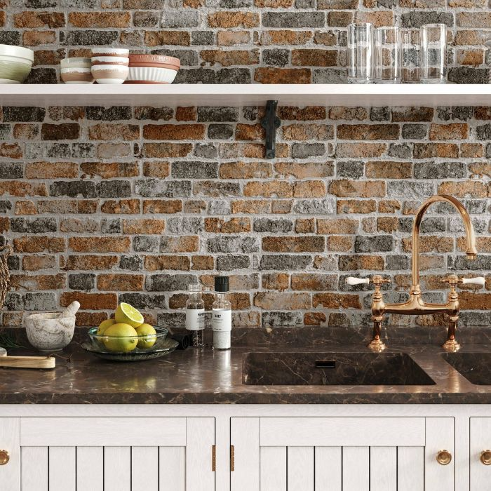 A stylish kitchen featuring a textured brick-effect wall and neatly arranged shelves