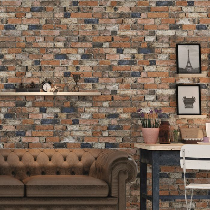 A cosy living room featuring stylish brick wall tiles, adding warmth and character