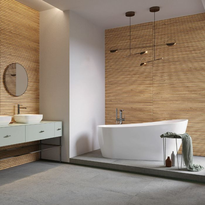 A sleek modern bathroom featuring elegant wooden wall tiles and a spacious bathtub