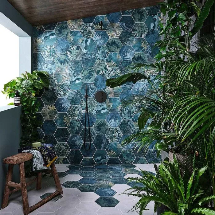 Bathroom with refreshing hexagonal tiles and lively green plants