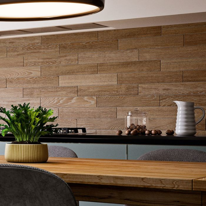 A warm kitchen featuring a wooden table and chairs, complemented by wood-effect wall tiles