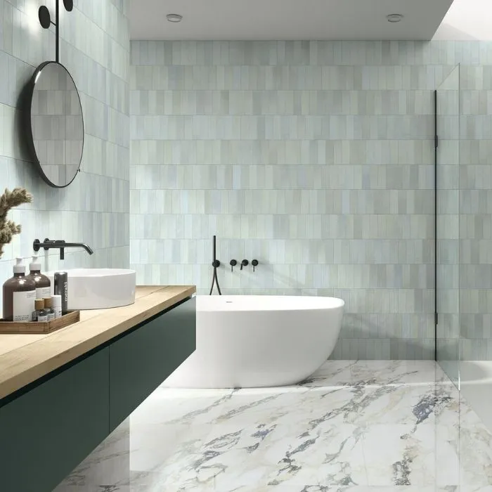 Luxurious marble-clad bathroom with ghost green ceramic wall tiles