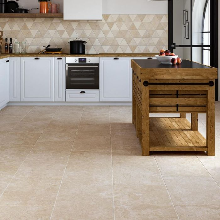 Elegant kitchen decor with porcelain floor tiles and wooden island